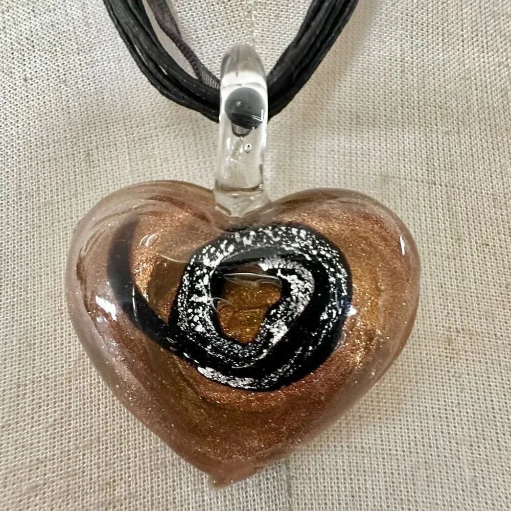 Gold tone black glass heart pendant necklace